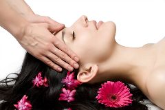 Complementary Therapies. facial pink flowers on her hair